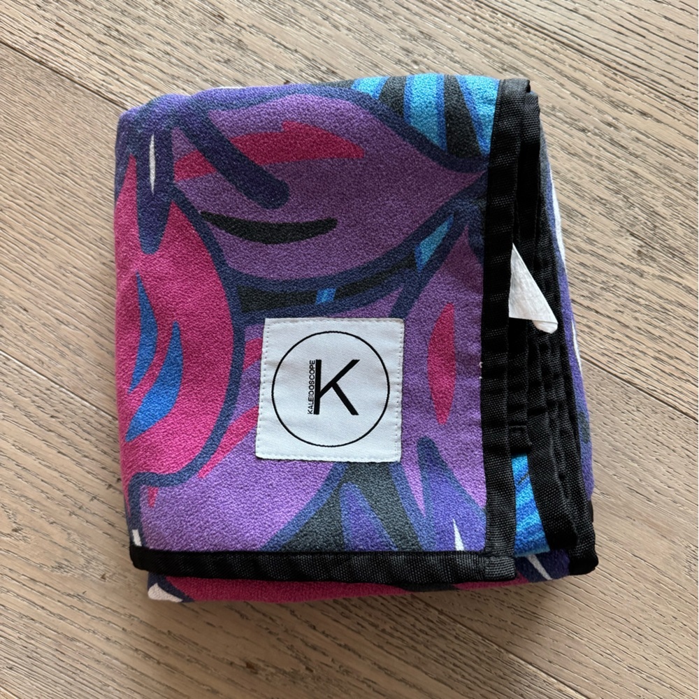 Kaleidoscope Purple Palm yoga towel with a tropical print and anti-slip backing